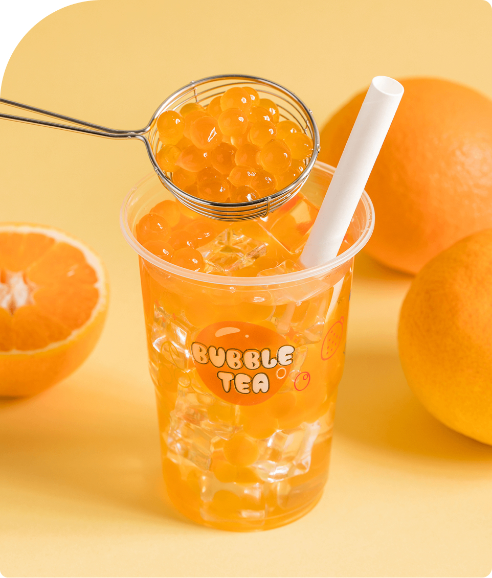 Napoj Bubble tea z pomaranczami i kawiorem molekularnym
